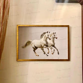Pair of white running horses